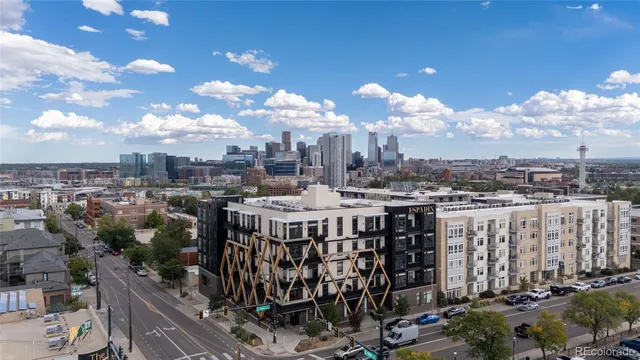 a view of a city with tall buildings