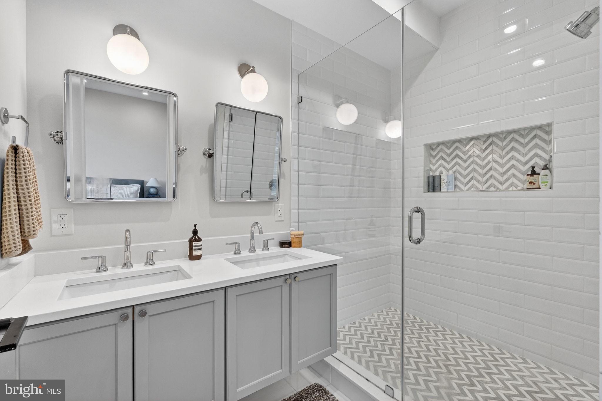1419 Upshur Street Northwest, Unit 2 Washington, DC 20011 - Photo 19 of 47 a bathroom with a double vanity sink mirror and double