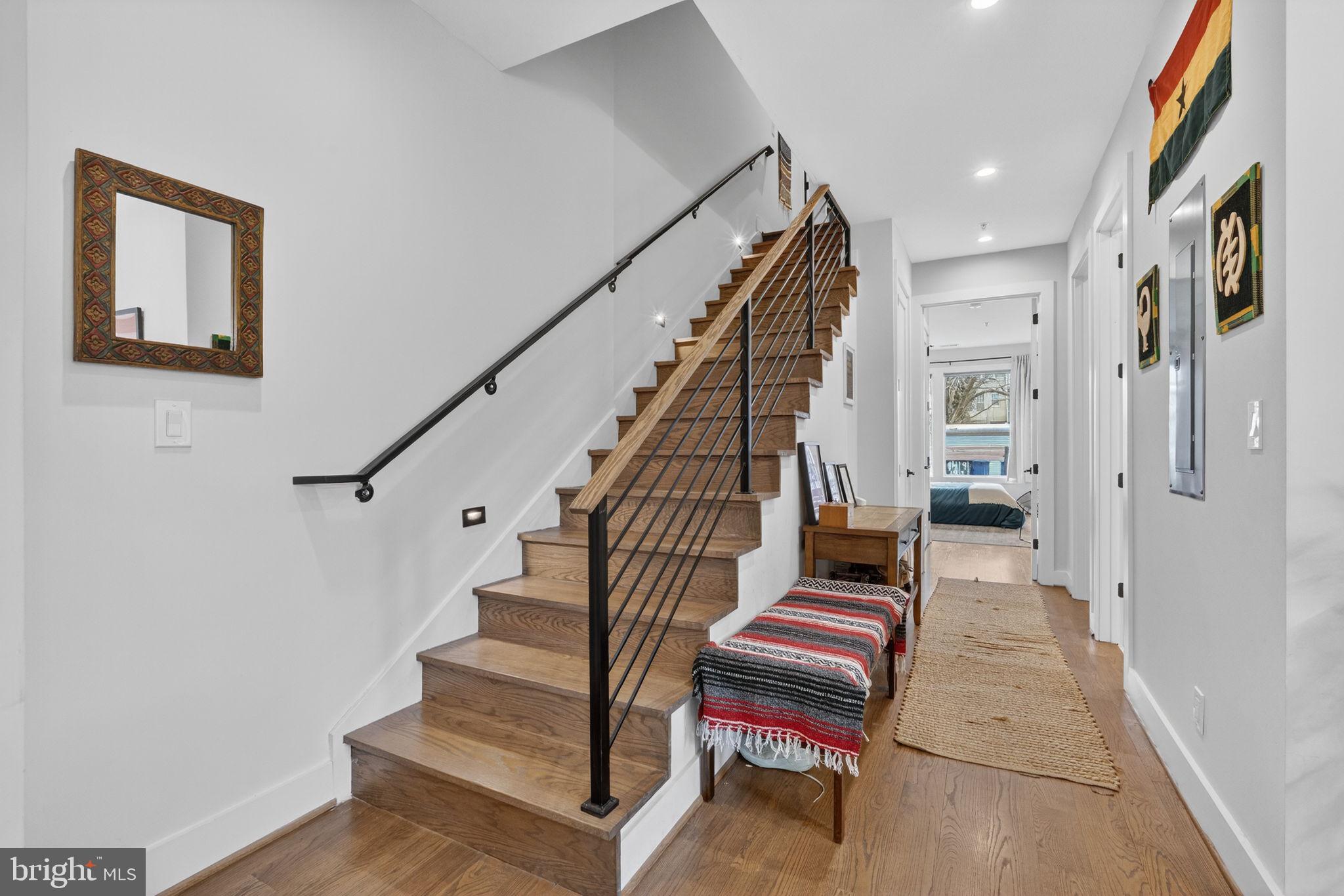 1419 Upshur Street Northwest, Unit 2 Washington, DC 20011 - Photo 23 of 47 a view of entryway and hall with wooden floor