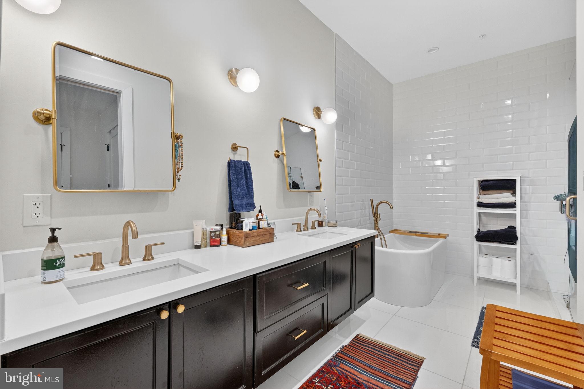1419 Upshur Street Northwest, Unit 2 Washington, DC 20011 - Photo 27 of 47 a en suite bathroom with a double vanity sink mirror and