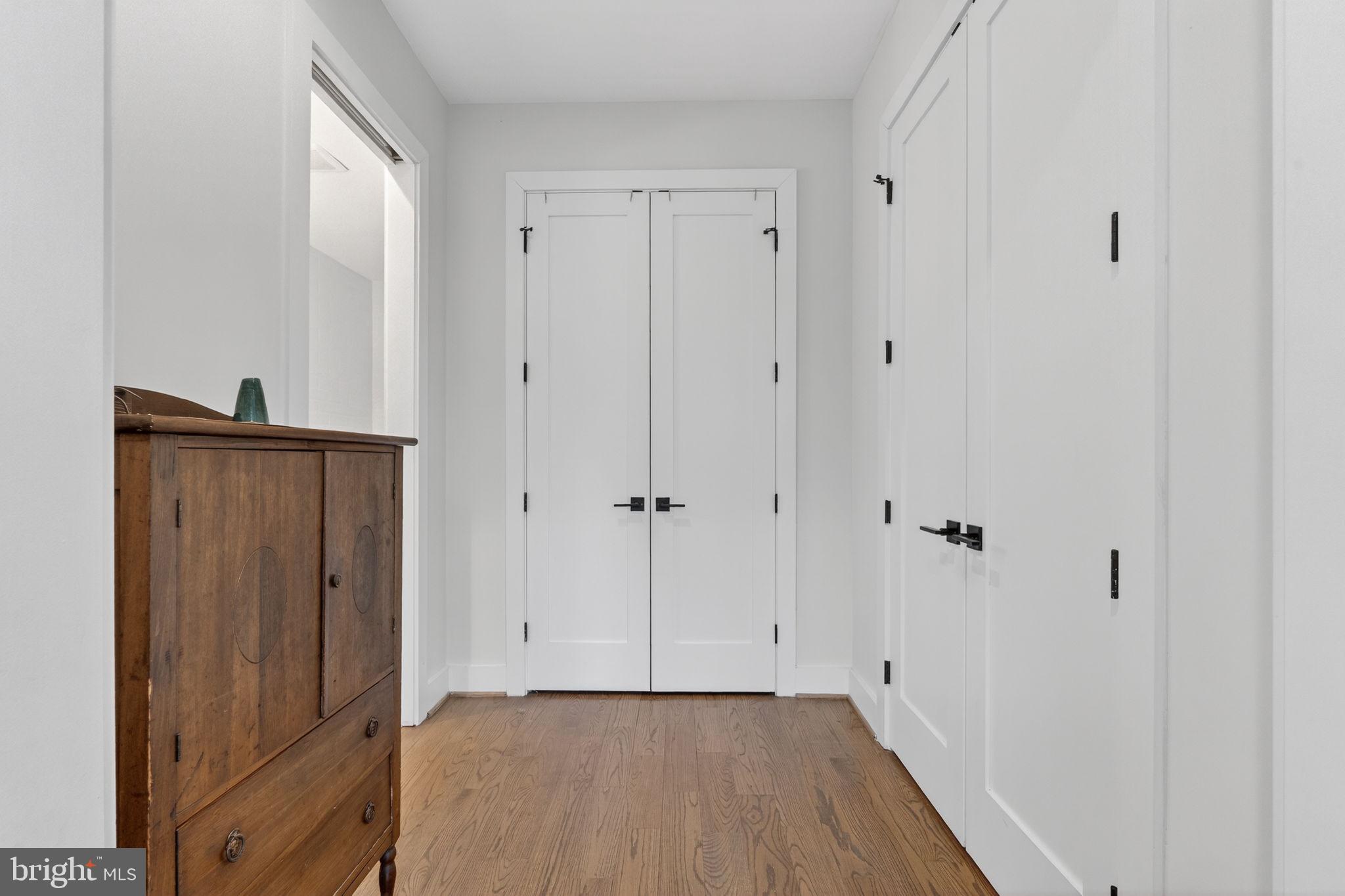 1419 Upshur Street Northwest, Unit 2 Washington, DC 20011 - Photo 30 of 47 a view of a hallway with wooden floor