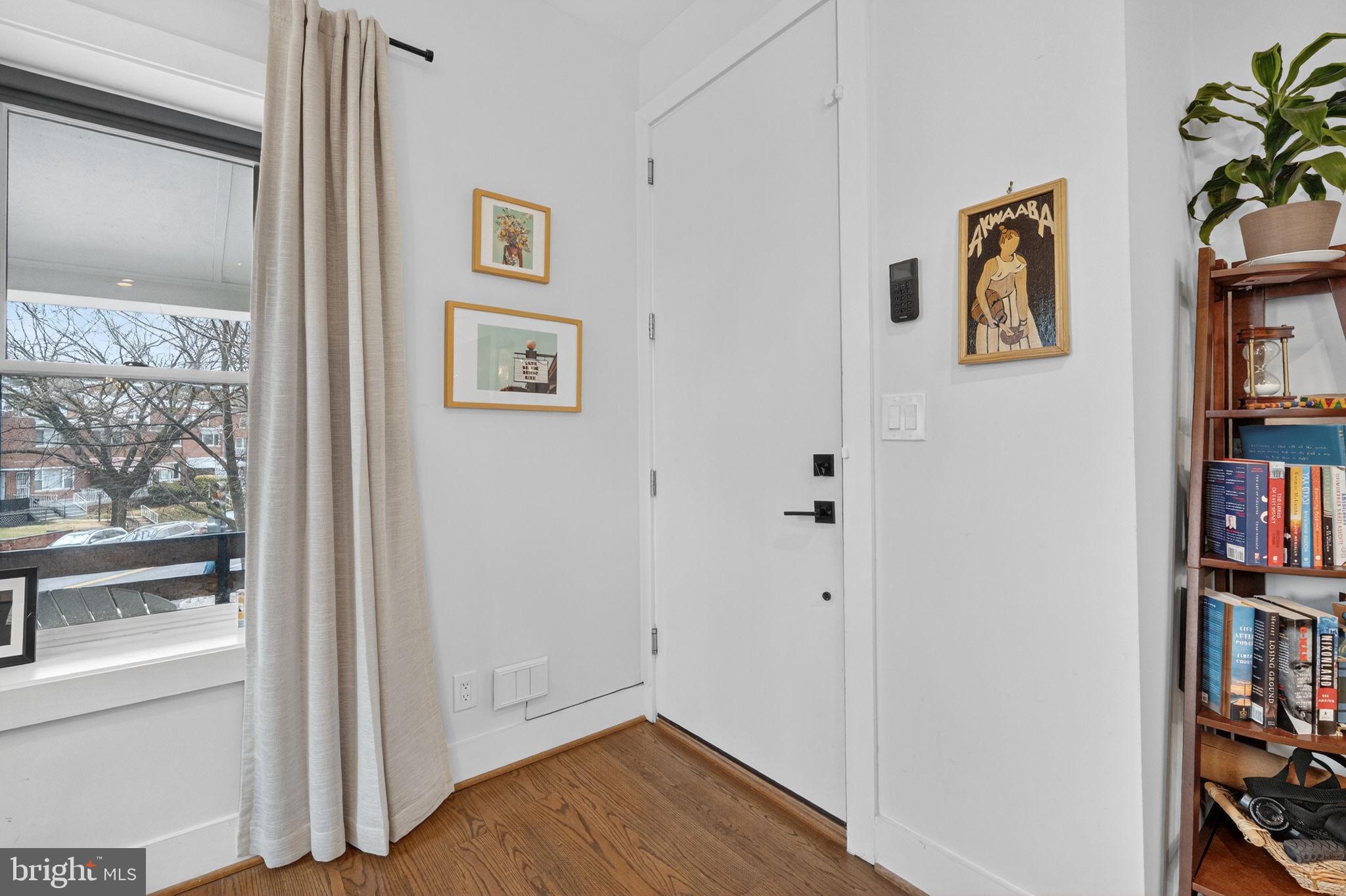 1419 Upshur Street Northwest, Unit 2 Washington, DC 20011 - Photo 3 of 47 a view of a hallway with closet