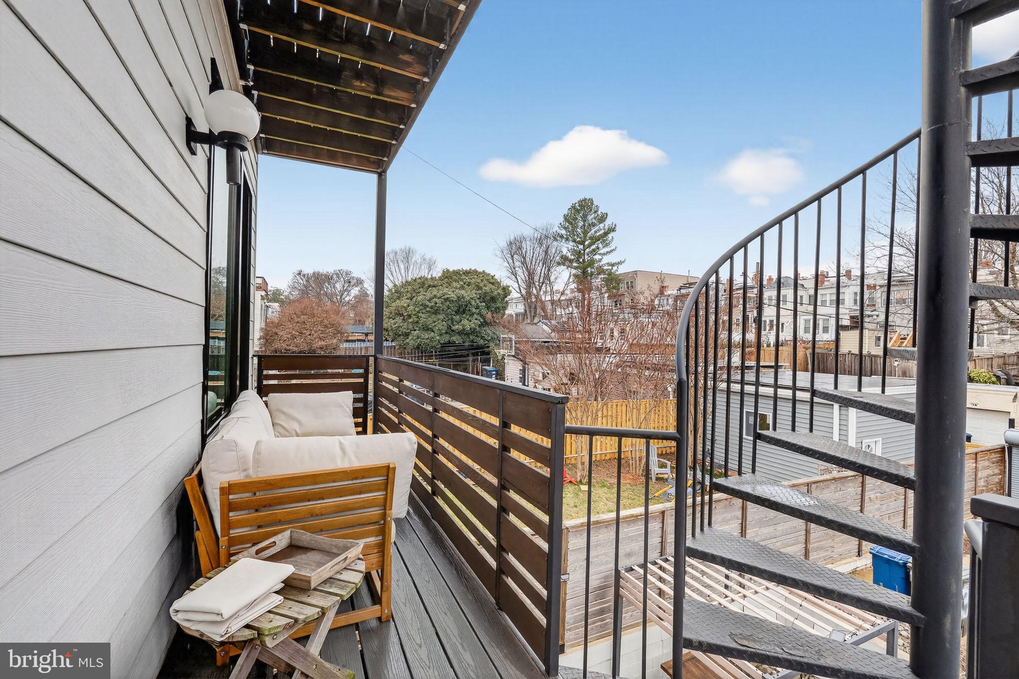 1419 Upshur Street Northwest, Unit 2 Washington, DC 20011 - Photo 31 of 47 a view of balcony with wooden floor