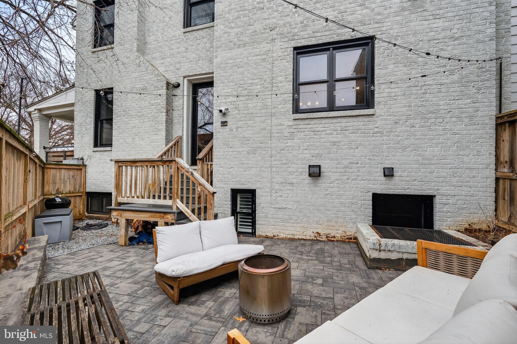1419 Upshur Street Northwest, Unit 2 Washington, DC 20011 - Photo 41 of 47 a view of a patio with couches and a fire pit