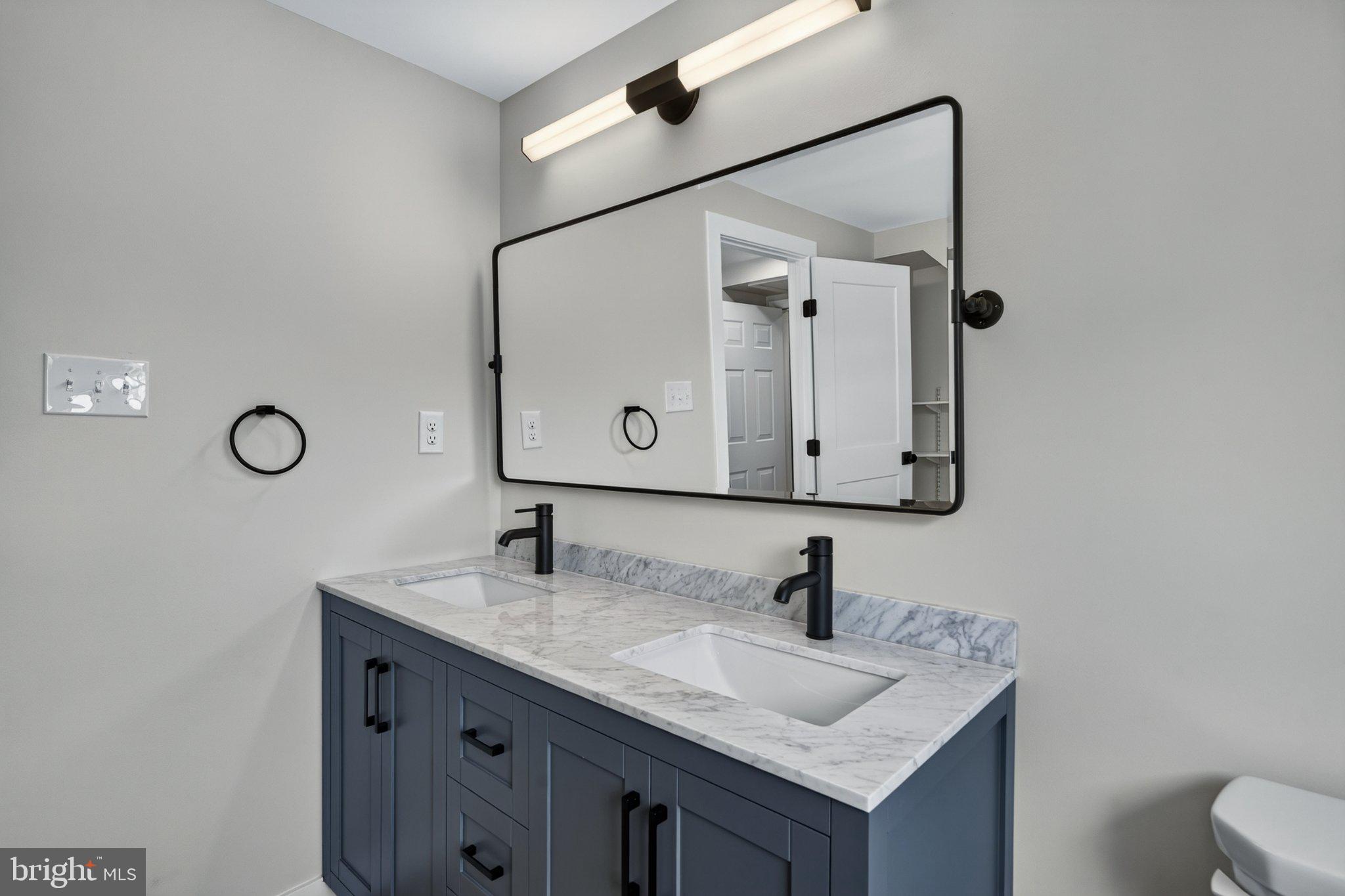 2069 Dutton Mill Road Newtown Square, PA 19073 - Photo 35 of 70 Sleek modern bathroom with elegance.