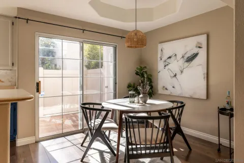 a view of a dining room with furniture window and outside view