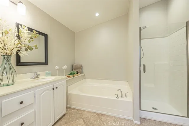 a bathroom with a bathtub and a sink