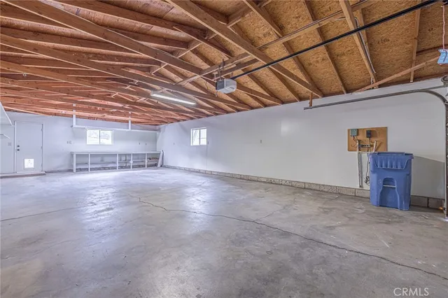 a view of empty room with stairs