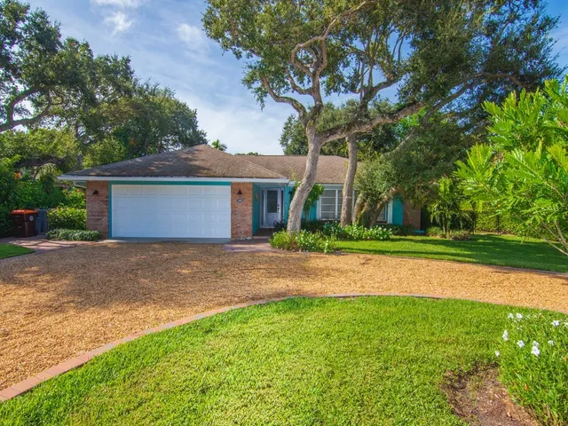 a house view with a garden space