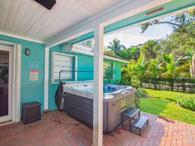 a view of backyard with trampoline