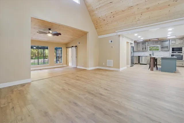 a view of livingroom with furniture and windows