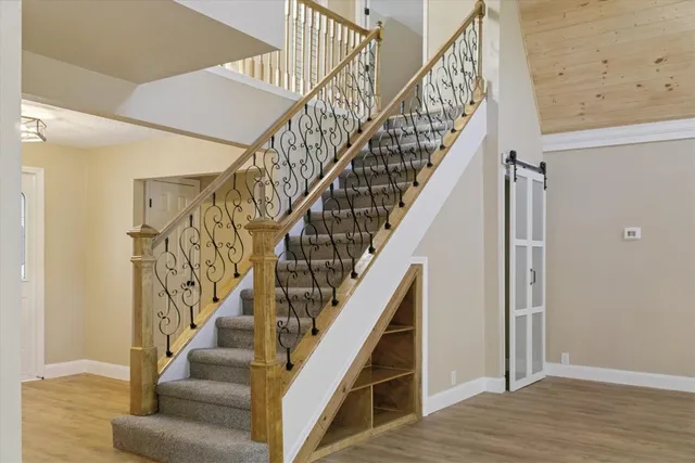 a view of entryway with wooden floor