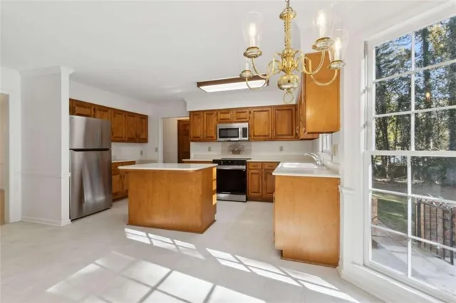 a view of an entryway with wooden floor and a front door