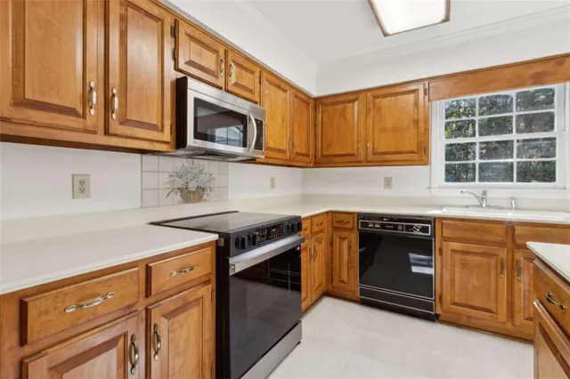 a bathroom with a tub shower and sink