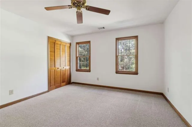 a view of a lake with a city