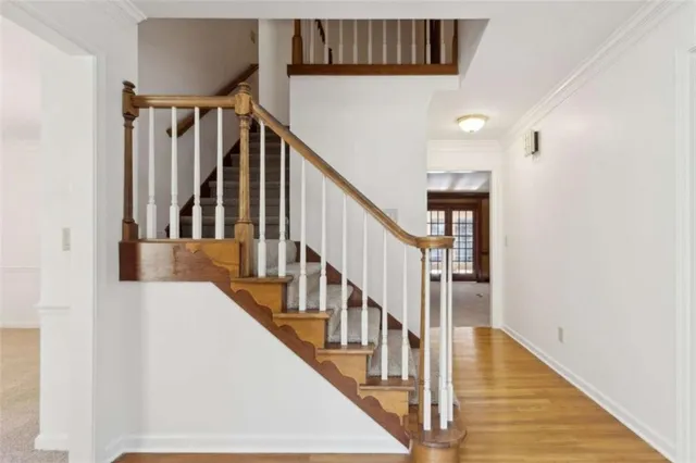 a view of a chandelier in big room and chandelier