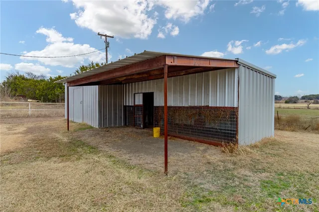 a view of backyard of house