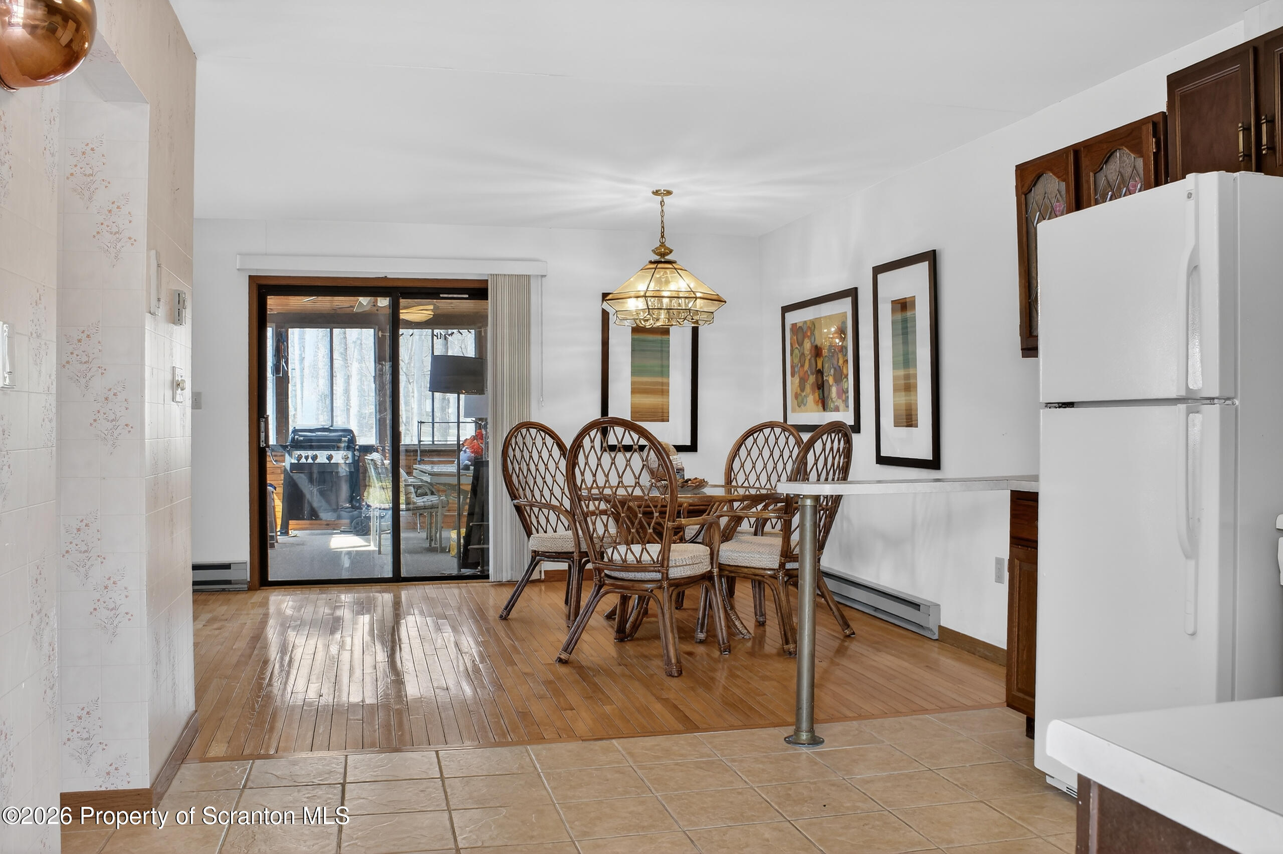 211 Falls Circle Bushkill, PA 18324 - Photo 5 of 28 a dining room with furniture and window