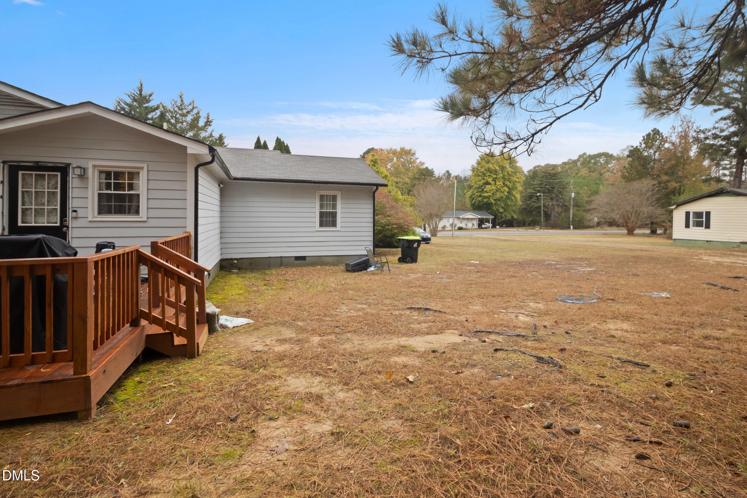 2930 Thomas Road Henderson, NC 27537 - Photo 12 of 17 a view of a house with a yard