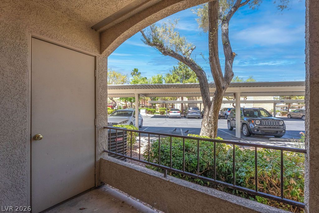 7885 West Flamingo Road, Unit 1016 Las Vegas, NV 89147 - Photo 21 of 24 Secure covered parking, providing convenient access and protection for your vehicles.
