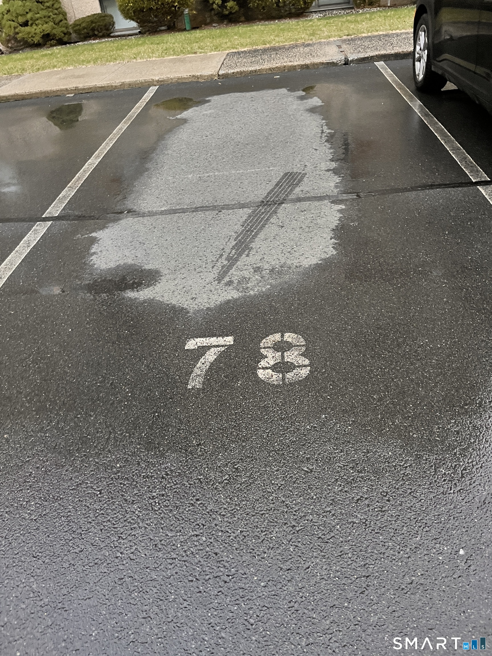 96 Putter Drive, Unit 510N Wallingford, CT 06492 - Photo 20 of 23 a view of a parking area