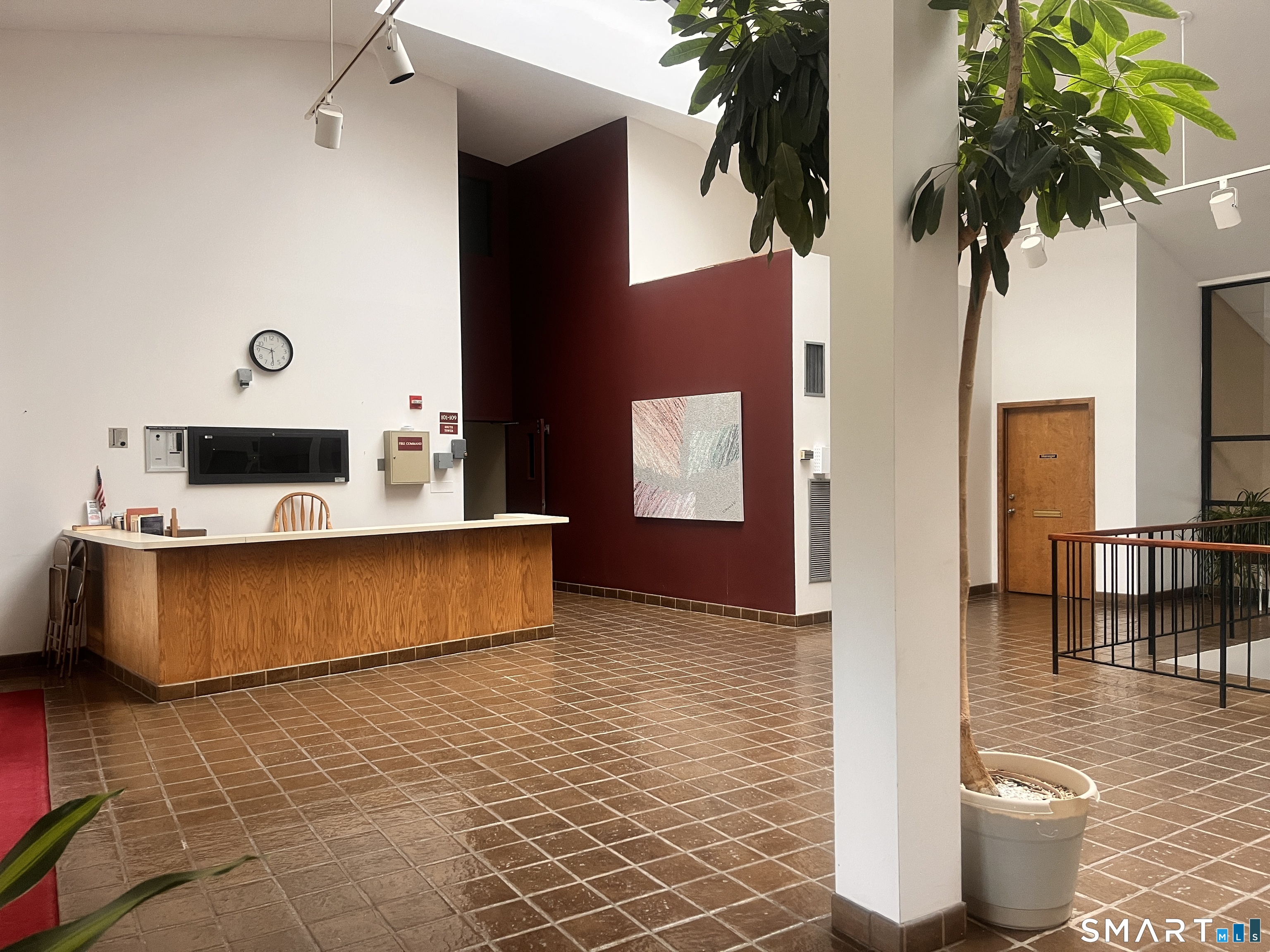 96 Putter Drive, Unit 510N Wallingford, CT 06492 - Photo 5 of 23 a room with pool table and potted plants