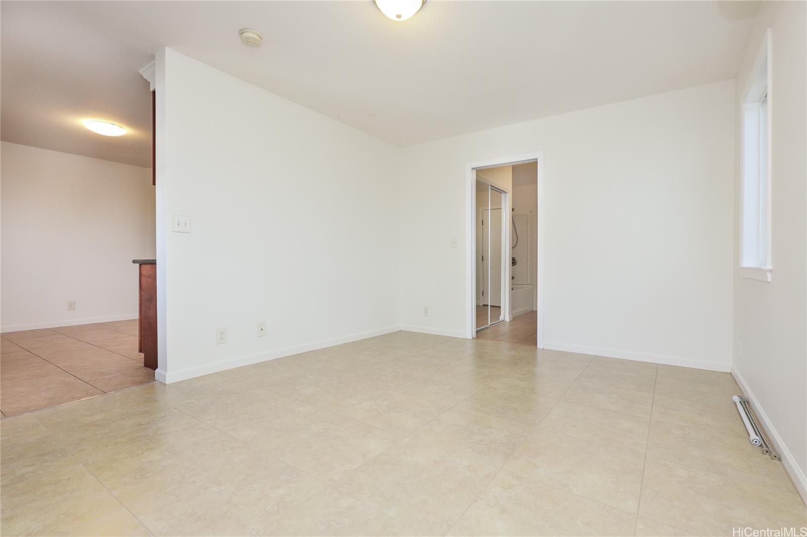 99-036 Moanalua Road, Unit A1 Aiea, HI 96701 - Photo 16 of 18 an empty room with closet and bathroom