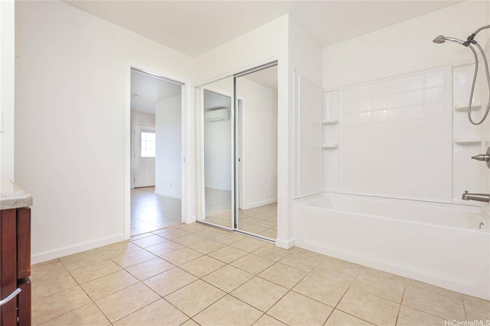 99-036 Moanalua Road, Unit A1 Aiea, HI 96701 - Photo 10 of 18 a view of an empty room