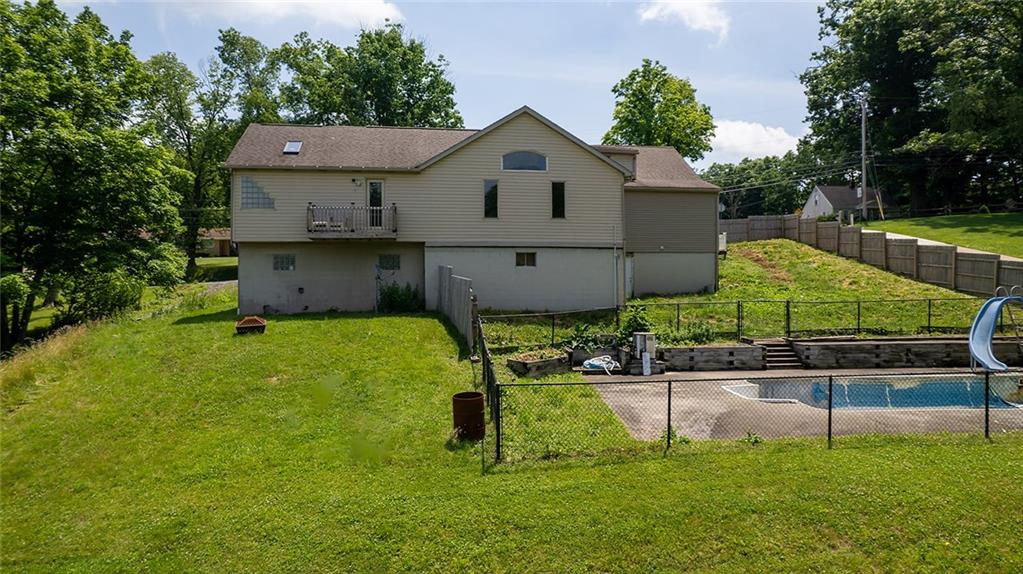 1378 Robbins Station Road Irwin, PA 15642 - Photo 48 of 50 a front view of a house with a yard