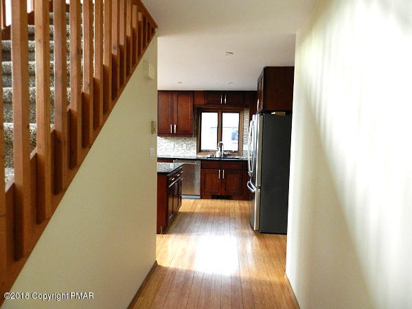 171 Salisbury Road Bushkill, PA 18324 - Photo 21 of 31 Hallway w Kitchen view