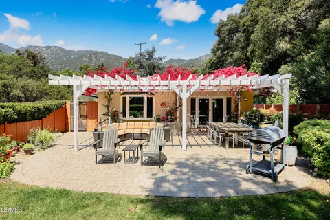 a view of a tables and chairs in patio
