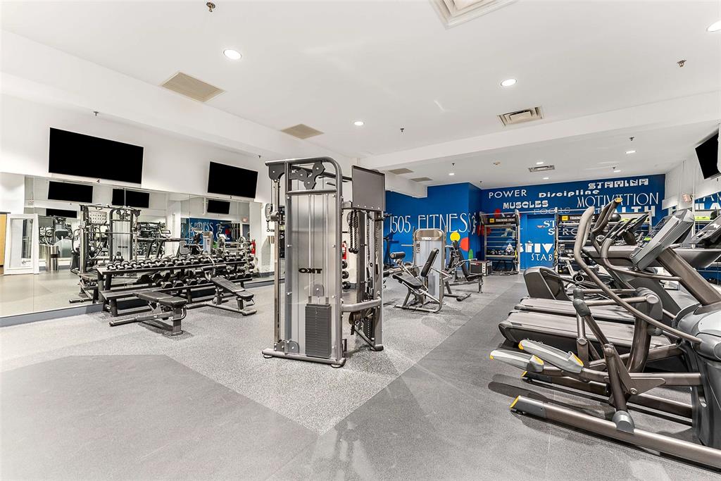 1505 Elm Street, Unit 1003 Dallas, TX 75201 - Photo 26 of 33 a view of a room with gym equipment
