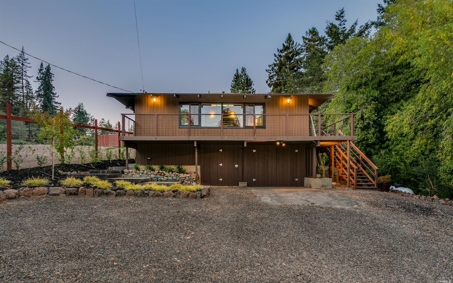 11340 Occidental Road Sebastopol, CA 95472 - Photo 1 of 1 a front view of house with a garden