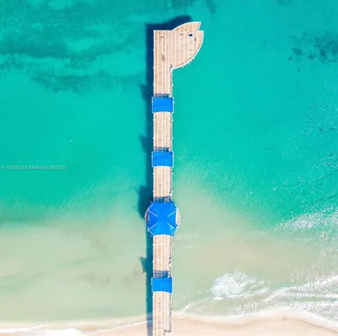 a group of people sitting in front of a building