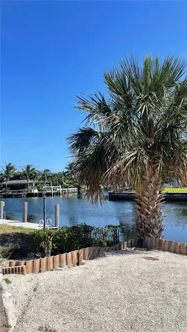 a view of a chairs and table on the terrace