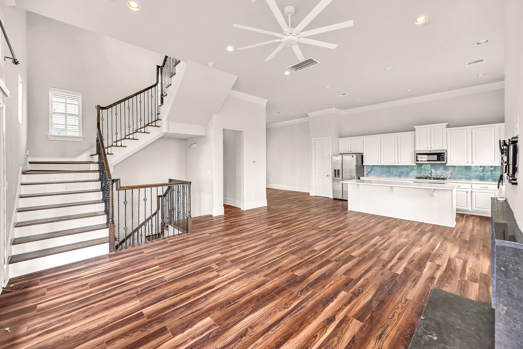 9644 Knight Road Houston, TX 77045 - Photo 11 of 28 a view of a kitchen with wooden floor and a kitchen view