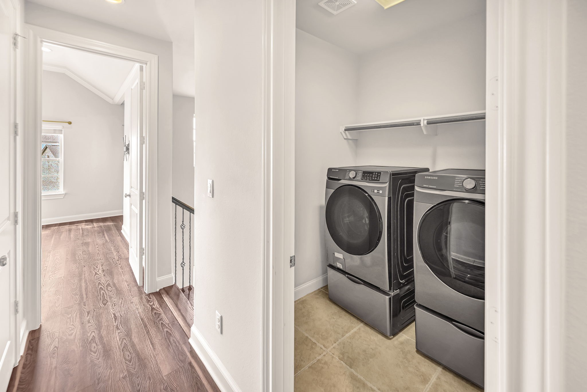 9644 Knight Road Houston, TX 77045 - Photo 14 of 28 a utility room with closet dryer and washer