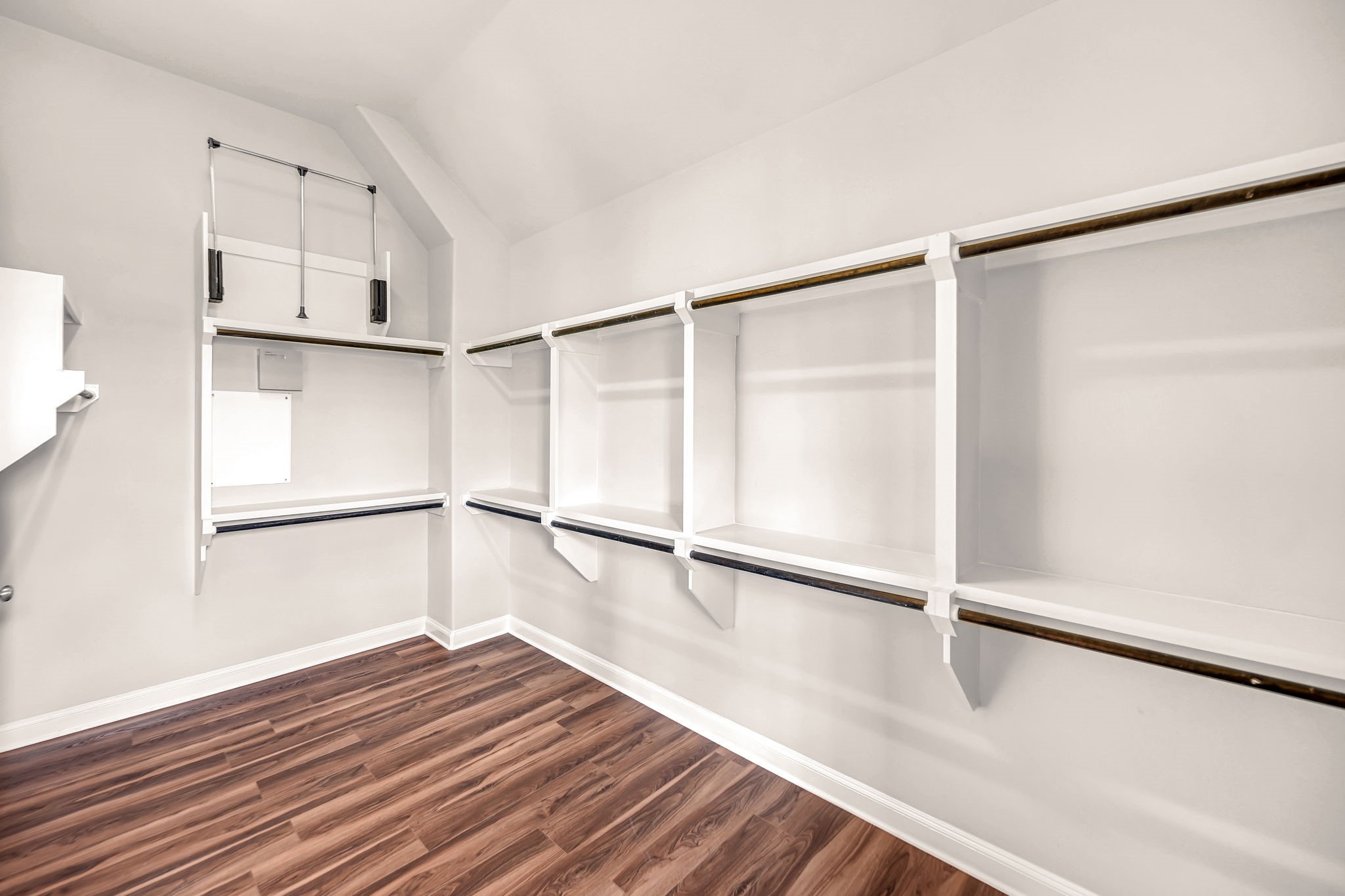 9644 Knight Road Houston, TX 77045 - Photo 17 of 28 a view of an empty room with wooden floor