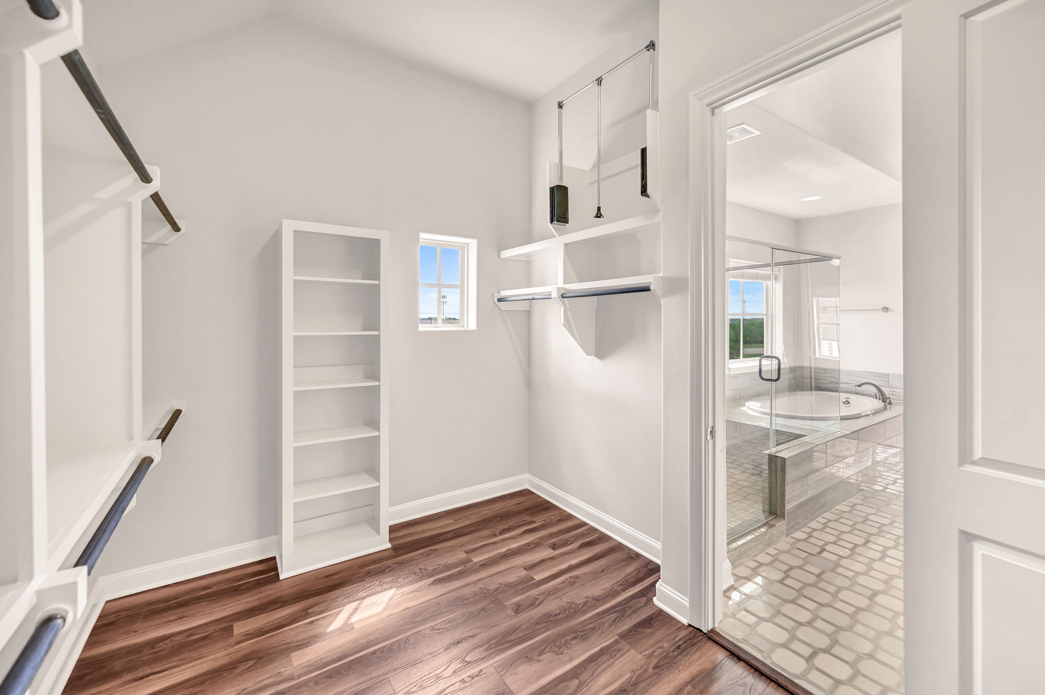 9644 Knight Road Houston, TX 77045 - Photo 18 of 28 a view of a hallway view with wooden floor and staircase