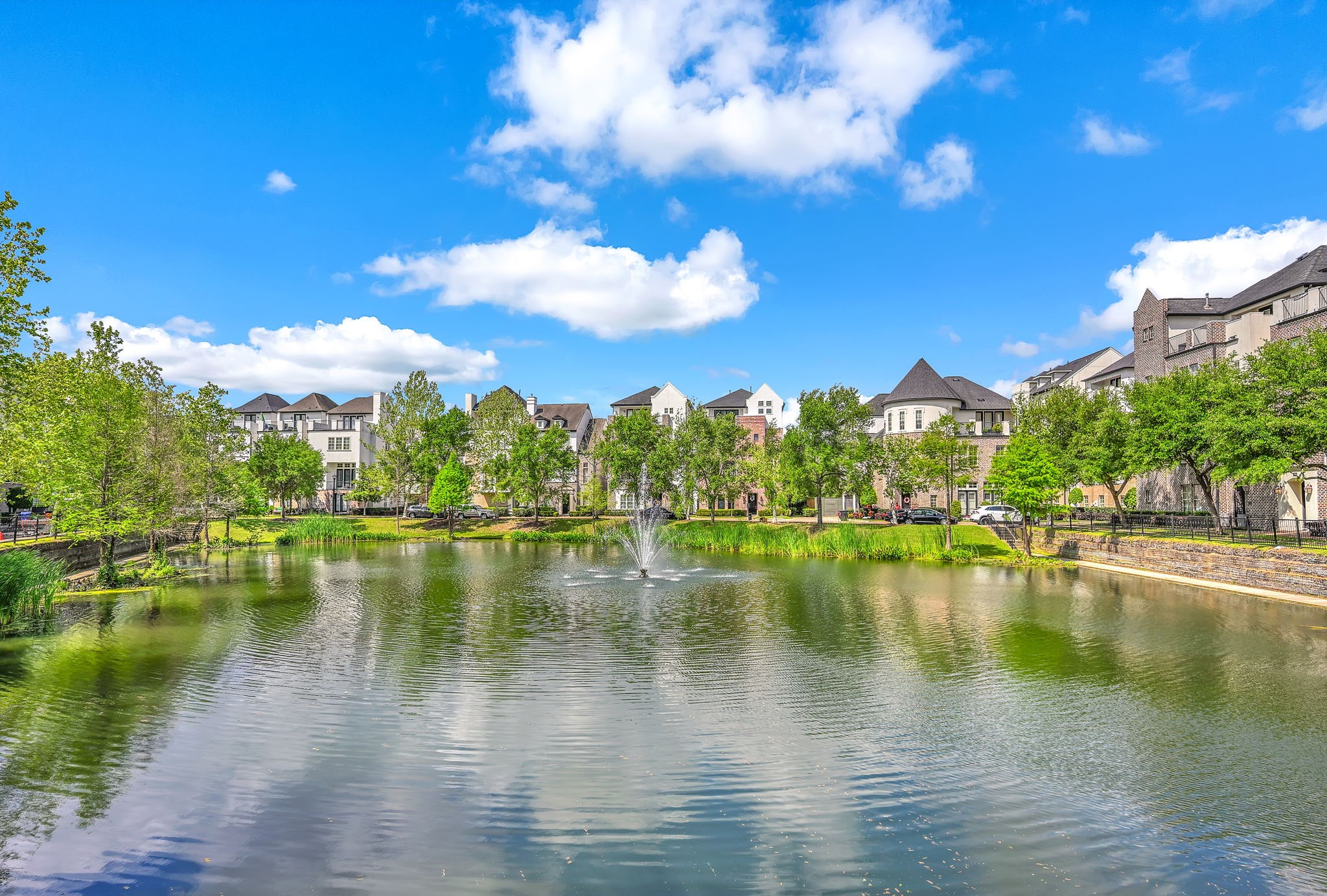 9644 Knight Road Houston, TX 77045 - Photo 25 of 28 a view of a lake with houses in the background