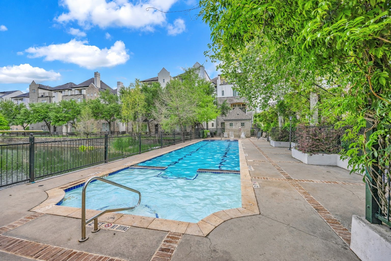 9644 Knight Road Houston, TX 77045 - Photo 26 of 28 a view of a lake with a yard