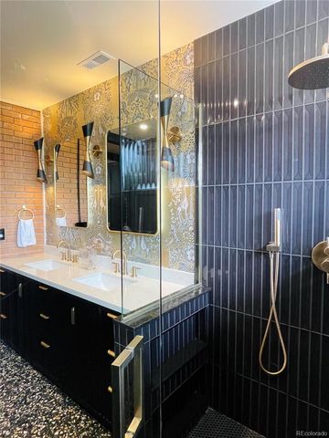 a bathroom with a sink and a shower