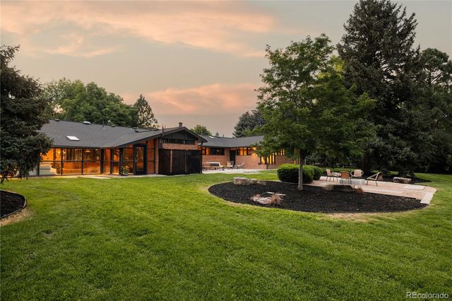 a view of house with outdoor space and entertaining space