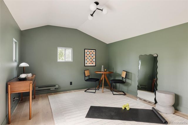 a room with furniture and a chair