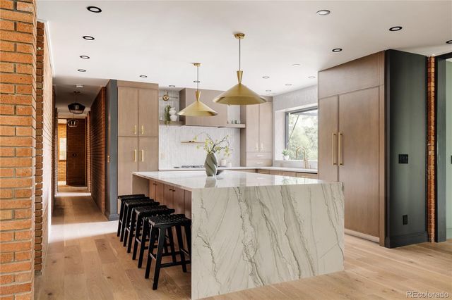a view of kitchen with furniture and window