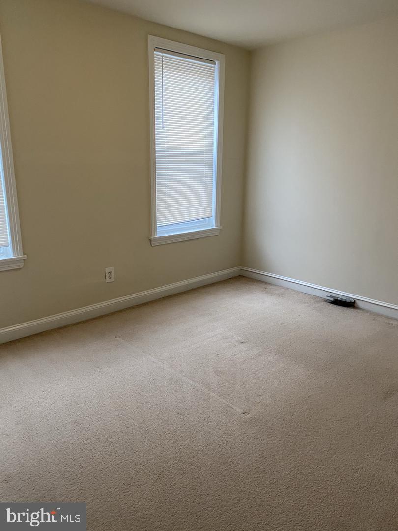 460 Moyer Street Philadelphia, PA 19125 - Photo 8 of 10 an empty room with a window
