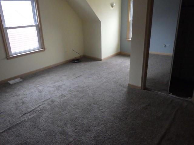 3756 West 85th Place Chicago, IL 60652 - Photo 15 of 19 an empty room with windows