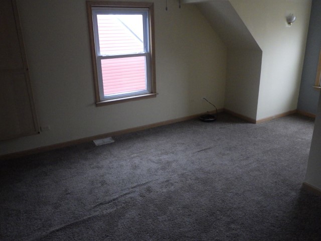 3756 West 85th Place Chicago, IL 60652 - Photo 16 of 19 an empty room with a window