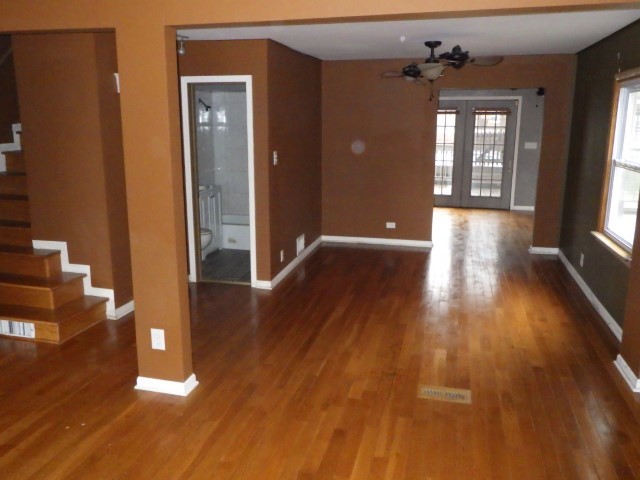 3756 West 85th Place Chicago, IL 60652 - Photo 2 of 19 a view of livingroom with hardwood floor and windows