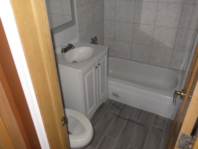 3756 West 85th Place Chicago, IL 60652 - Photo 6 of 19 a bathroom with a sink and toilet